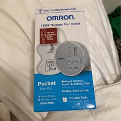 Tens Unit And Extra Pads 