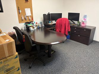 Larger U shaped desk with bookshelf’s and cabinets