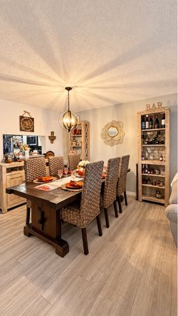 Rustic solid wood table, 6 chairs, buffet cabinet and book. Shelf’s