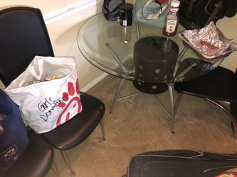 Nice wooden table and metal table with 4 chairs