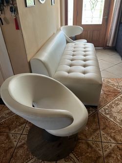White leather couch with 2 single rotating leather seats