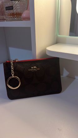 Red and dark brown coach wallet