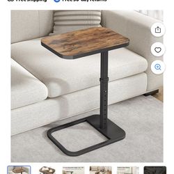 TV tray adjustable height & flip top and rounded metal corners.