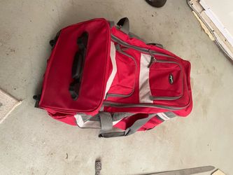 Olympia red rolling duffel bag