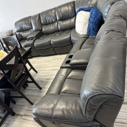 Spring Blowout Sale. Madrid Gray Leather Reclining Sectional Only $1399. Easy Finance Option. Same Same-Day Delivery.