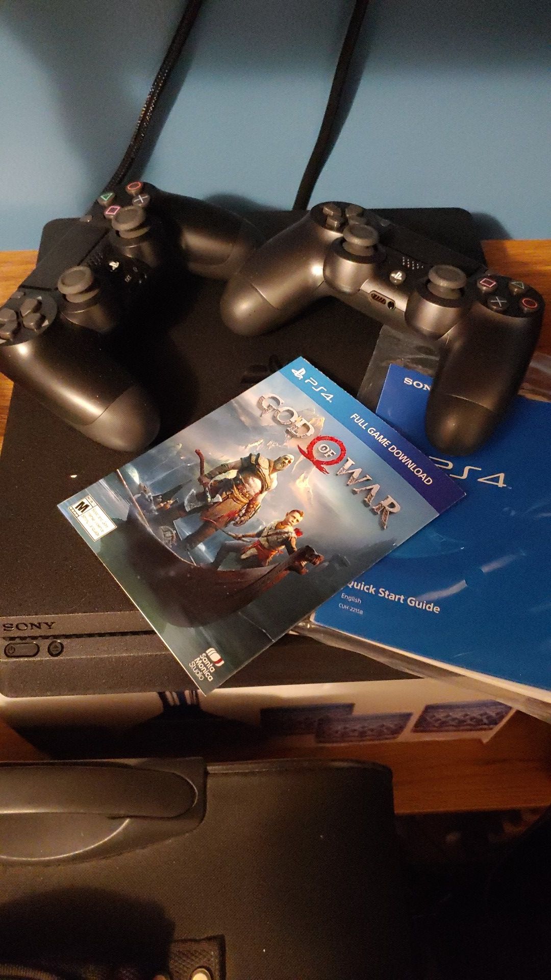 PS4 PLUS 2 CONTROLLERS AND 10 GAMES