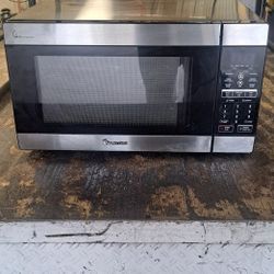 Large Stainless Steel Magic Chef Microwave.   Like New.  Paid 160. Selling For 80