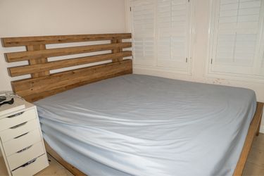 Wooden king size bed frame w a mattress