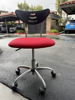 Sewing or desk chair on wheels