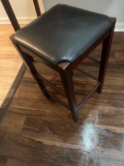 Leather and dark wood barstool