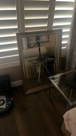 Wedding mirror says “our favorite people your seat awaits “for your guests table placements