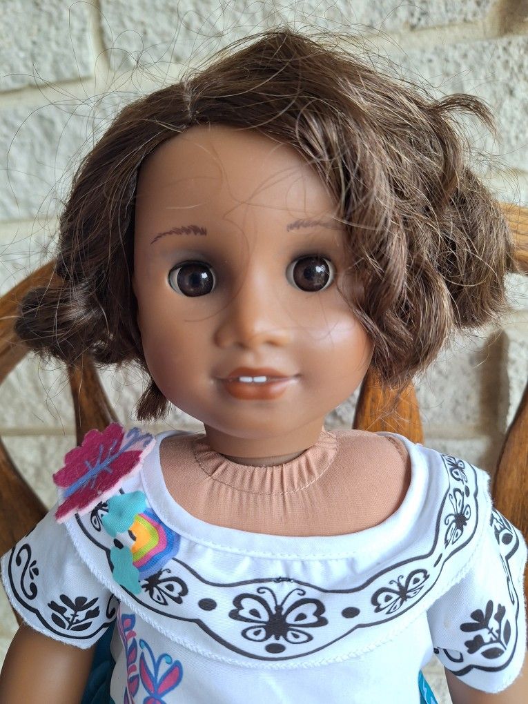 American Girl brand doll as Mirabel from Encanto