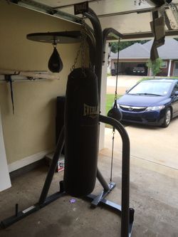 Three station best sale punching bag stand