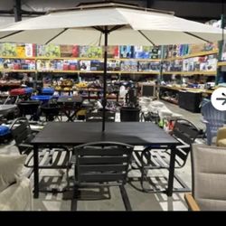 Brand New Patio Table Chairs And Umbrella 