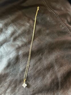 Woman’s chain and pendant