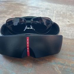 PRADA SUNGLASSES 