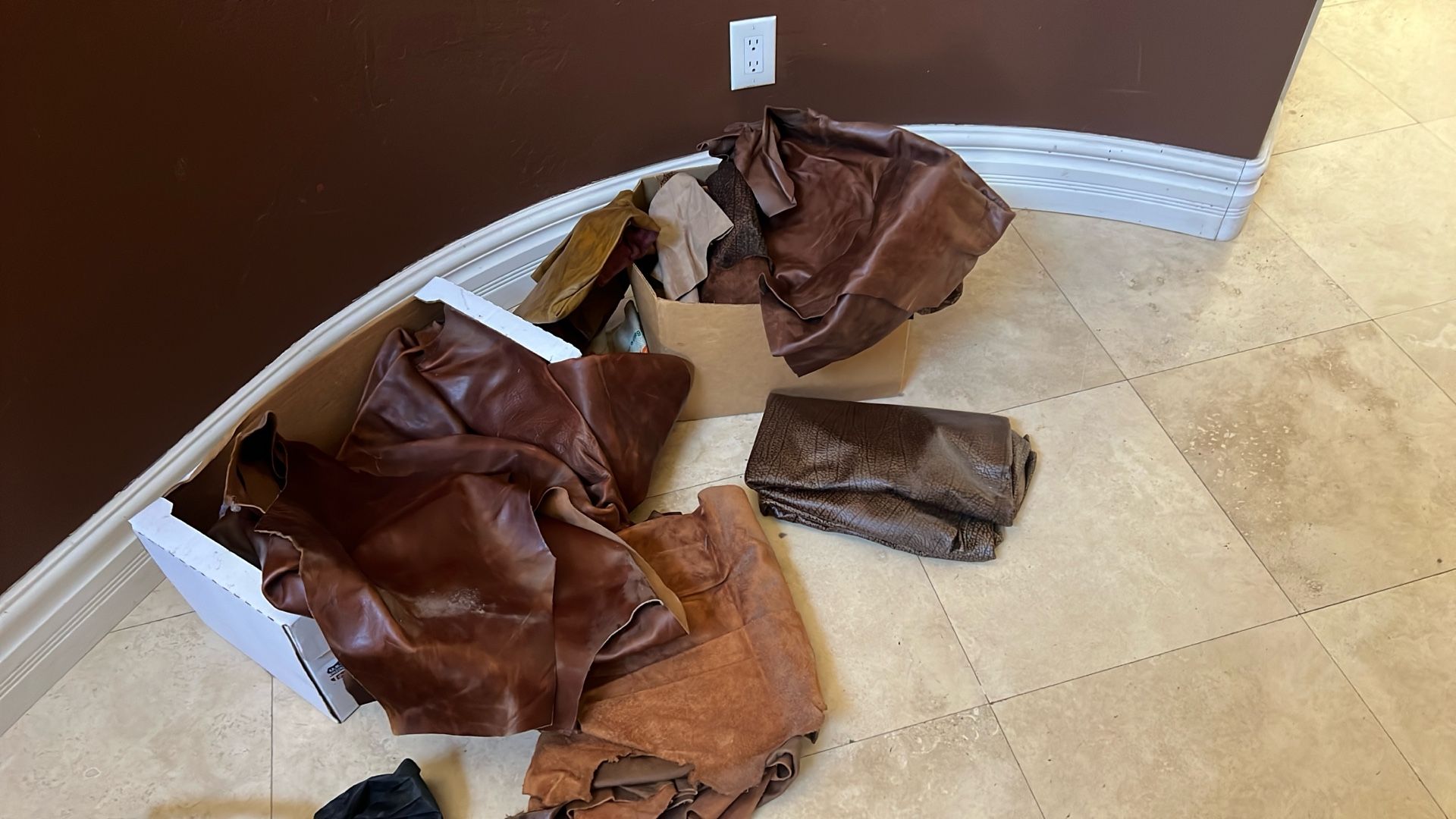 Leather Hides And Pieces. 2 Boxes Full