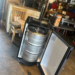 Keg stand refrigerator on tap