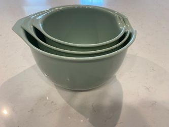 Various kitchenware including full dishware and silverware set