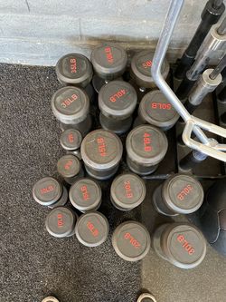 PRO DUMBBELL SETS:Pro Rubber Dumbbell Set- Premium Rubber Dumbbell Set Full set 5-50lb only sold in full set + two their saddle rack