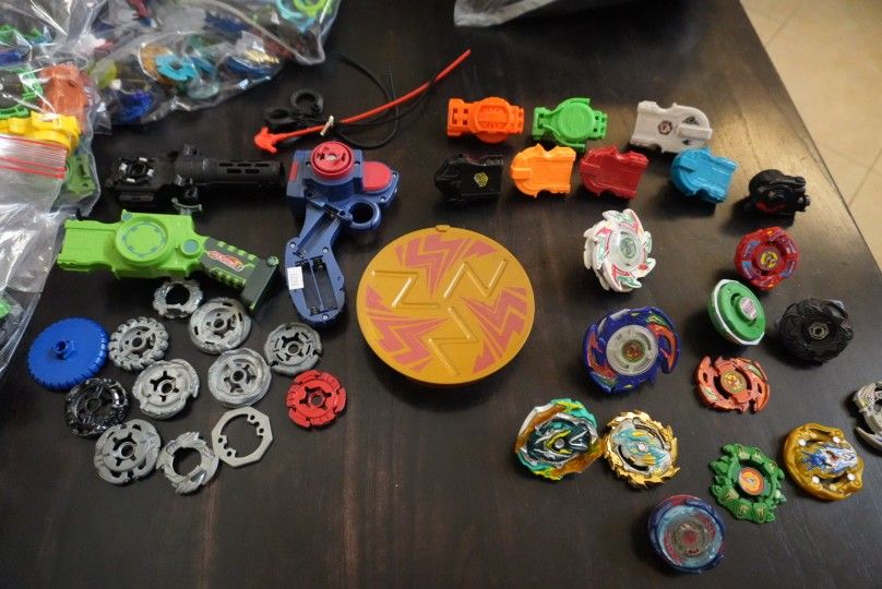 Massive Beyblade Lot – 100+ Pieces (Burst, Metal Fusion, Launchers & Parts)