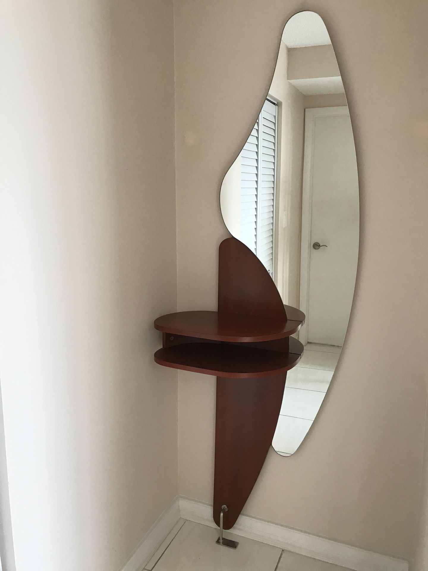 New Luxury Italian entrance console table with mirror. Mirror has a custom shape. Solid wood table color: Brown Cherry. H80”X W26”. Made In Italy .