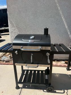 BRAND NEW ASSAMBLED FROM THE BOX CHARCOAL BBQ GRILL