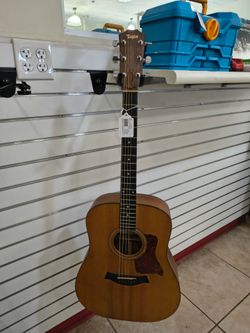 Taylor concert acoustic guitar