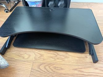 Retractable black desk