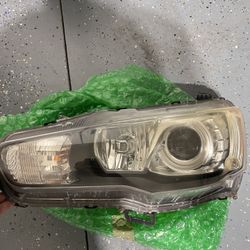 Mitsubishi Evolution X OEM projector headlights Driver side 