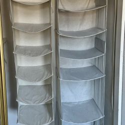 Two hanging fabric storage organizers. 