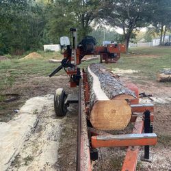 LT28 Woodmizer Portable Sawmill And Blade sharpener