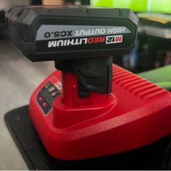 Milwaukee M12 high output XC5.0 Battery and Charger