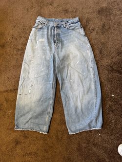 Acne Studios Light Wash Baggy Jeans with Paint Splatter