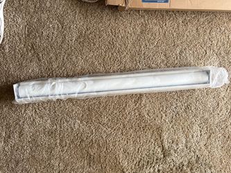 White Curtain Rod Still in Packaging