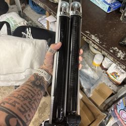 Strut and shock assembly