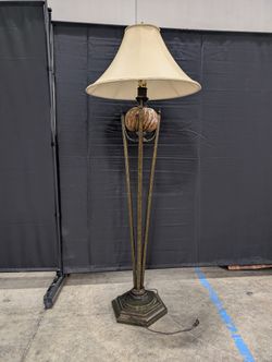 Dark Metal Three-Legged Floor Lamp with Cream Shade