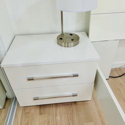 Two High Gloss White Laminate night stands.   