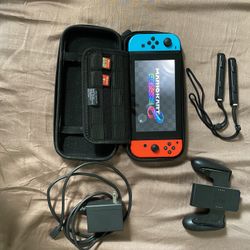 Nintendo Switch + Games + Case 