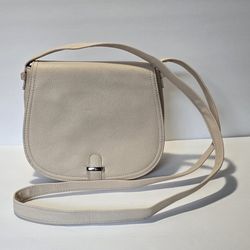 BRAND NEW ✨️ Unbranded faux leather, Cross Body Satchel in Ivory. Features silver-toned hardware, snap closure and lined interior with one flat pocket