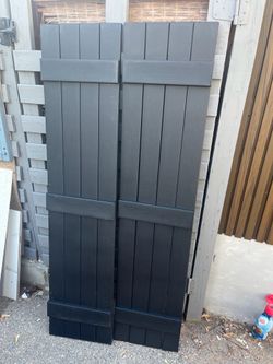 15 in. x 63 in. Board and Batten Shutters in Black NEW (2 pairs)