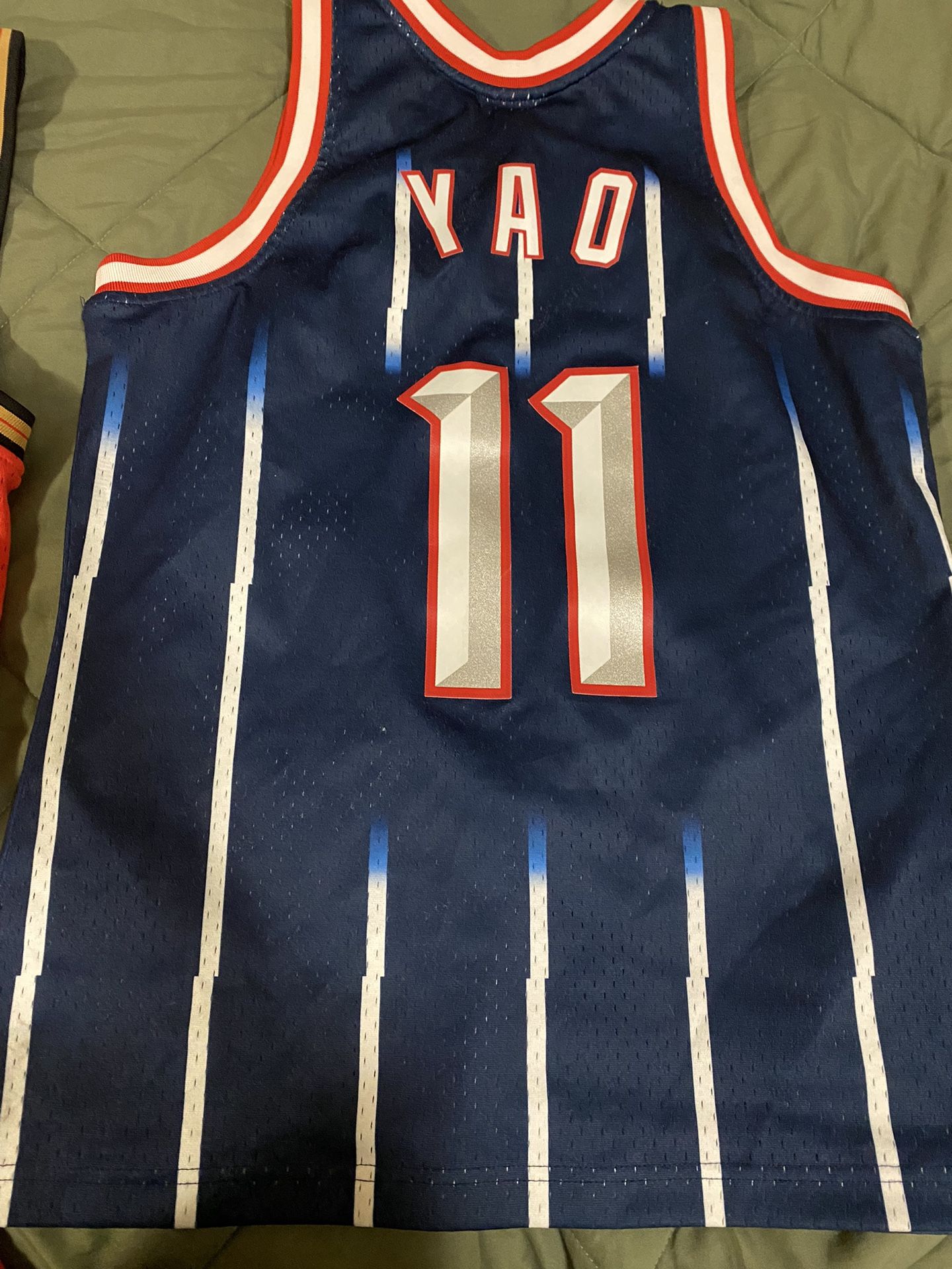 2 NBA Throwback jerseys The Iverson one is a Large The Yao Ming one is a Medium $40 A peice Both In Excellent Condition As U Can See