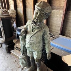 Kid Golfer statue By Jim Davidson