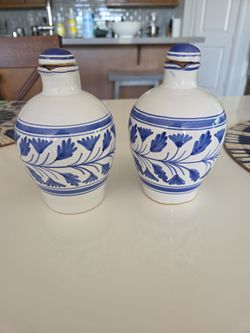 Olive oil vases with candle holders