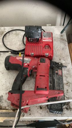 Brad nailer Milwaukee charger and battery all works perfect