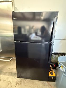 Black Whirlpool Top and Bottom Refrigerator with Ice Maker
