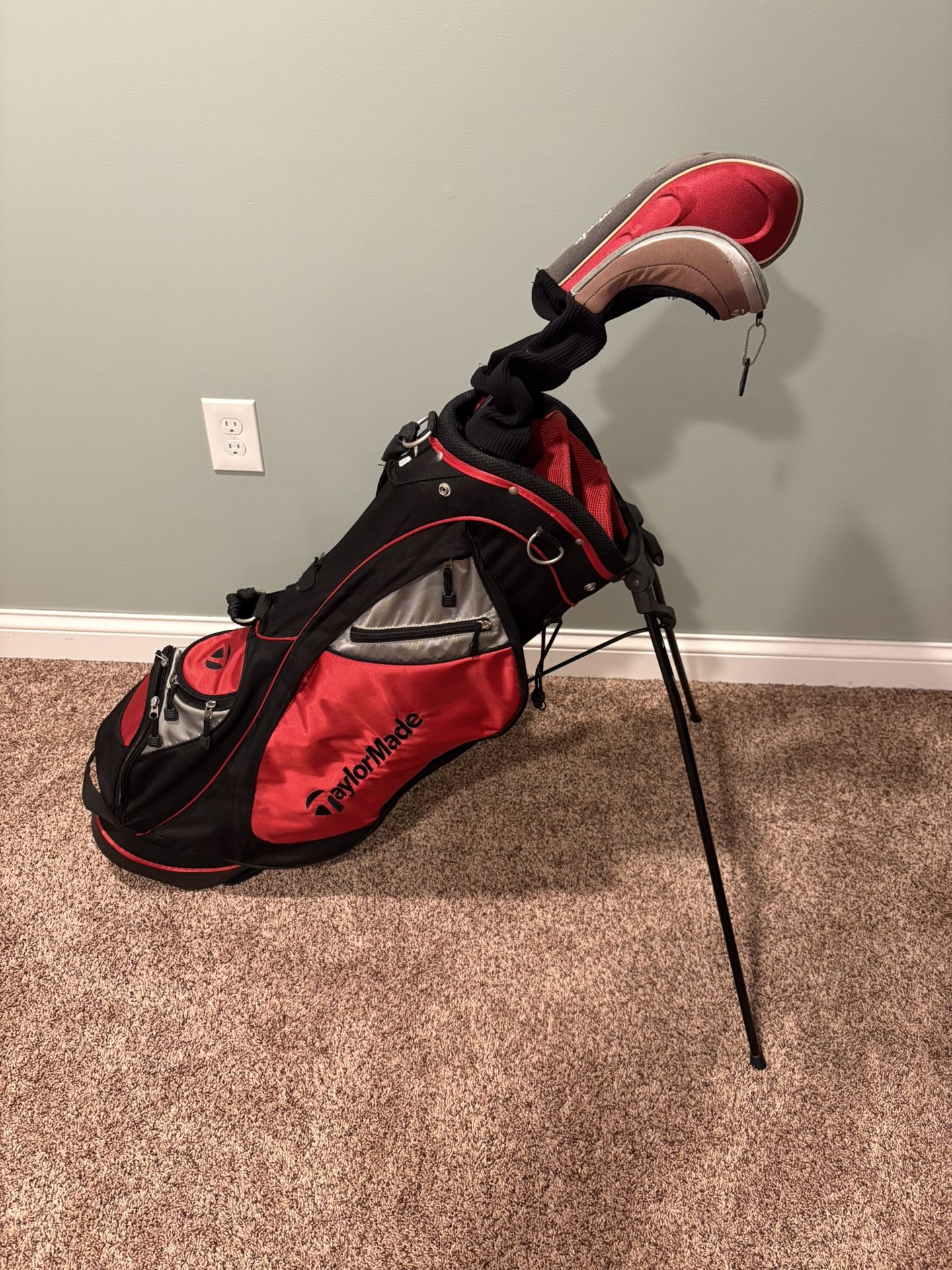 TaylorMade golf bag with driver and 3 wood (will sell separately)
