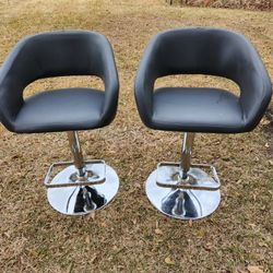 Two Pub Style Chairs