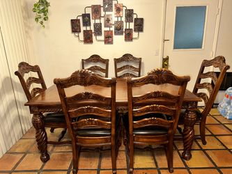Elegant Dark Brown Carved Wood Expandable Dining Table – 8 Chairs + 2 Leaves