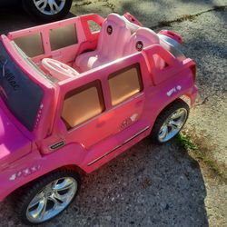 Little girls riding car